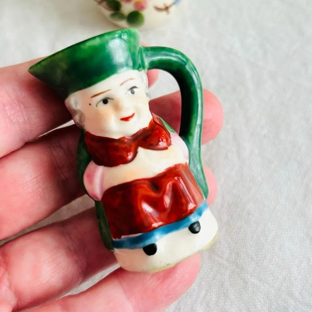 4 Vintage Miniature Pitchers Ceramic Floral Souvenir Toby Girl